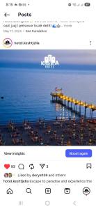 a page of a website with a pier in the water at Kaya by Keshtjella in Durrës