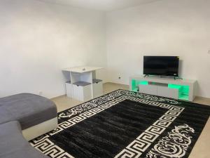 TV/trung tâm giải trí tại 3 zimmer Apartment