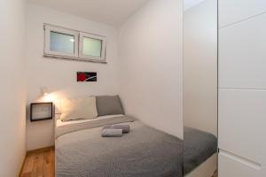 Ένα ή περισσότερα κρεβάτια σε δωμάτιο στο House Luisa near Fažana, Istria