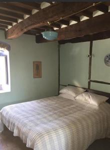 Postel nebo postele na pokoji v ubytování La casa della mì nonna