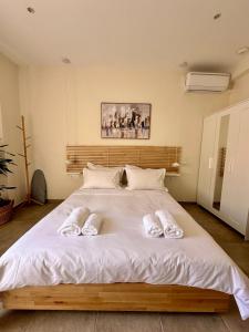 Кровать или кровати в номере Leandros Cfu flat +17 фотографий