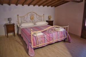 En eller flere senge i et værelse på Agriturismo Pompilia + 30 billeder