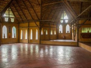 a large room with a large wooden floor and a large hall at Turtle Cove Self-Catering in Praia do Tofo