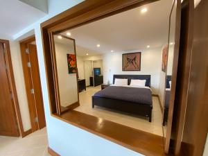 Ένα ή περισσότερα κρεβάτια σε δωμάτιο στο Andaman Hill Pool Seaview