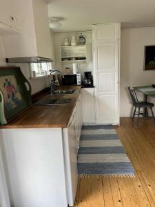 Kuchyň nebo kuchyňský kout v ubytování Mölle by the Sea