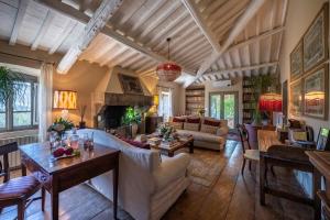 Posezení v ubytování Case Novole 10 Emma Villas