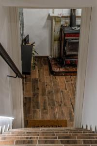 a view of a stairway with a stove in a room at AP Apartment B&B in Bagnoli Irpino