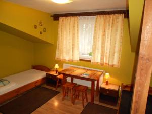 Letto o letti in una camera di Na Skraju Lasu