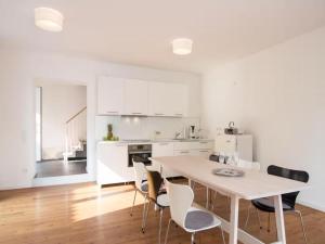 Kuchyň nebo kuchyňský kout v ubytování Brunnenhaus Land-Idylle in der Stadt + 30 fotografií