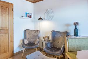 Posezení v ubytování Beckenbinder Apartement Schlern