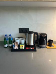 a tray with a coffee maker on a kitchen counter at Mirşah SUİT in Bezkesen