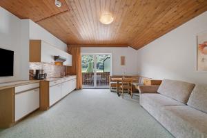 Kuchyň nebo kuchyňský kout v ubytování Rosalie Apartments