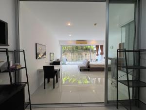 Postel nebo postele na pokoji v ubytování Chic Condo Karon Beach + 34 fotografií