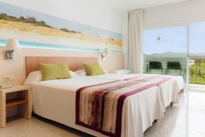 Postel nebo postele na pokoji v ubytování Hotel Moon Dreams Coral Beach