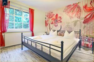 Postel nebo postele na pokoji v ubytování Ferienhaus Zirchow 2