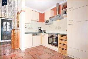 Kuchyň nebo kuchyňský kout v ubytování Ferienhaus Zirchow 2 + 26 fotografií