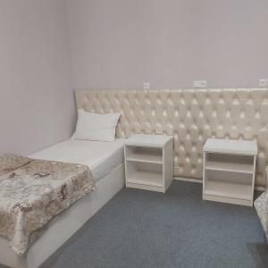 Voodi või voodid majutusasutuse Golden house hotel toas