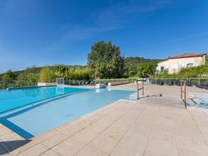 a large swimming pool in a villa at Vacancéole – Le Domaine de Camiole in Callian +129 photos