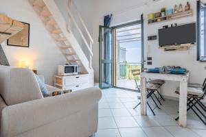 TV a/nebo společenská místnost v ubytování Cielomare