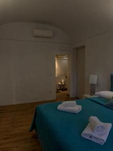 Ένα ή περισσότερα κρεβάτια σε δωμάτιο στο AH Suite Montecitorio