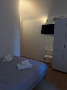 Ένα ή περισσότερα κρεβάτια σε δωμάτιο στο AH Suite Montecitorio +7 φωτογραφίες