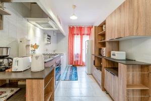 Kuchyň nebo kuchyňský kout v ubytování Le Taulignan