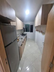 Η κουζίνα ή μικρή κουζίνα στο Appartement confortable et lumineux à RABAT