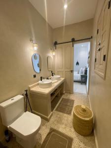 Koupelna v ubytování Riad 30