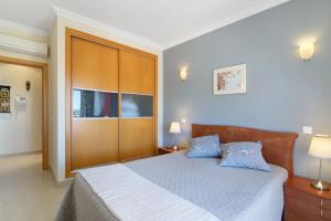 Postel nebo postele na pokoji v ubytování Apartamento T1 - Em zona tranquila + 13 fotografií