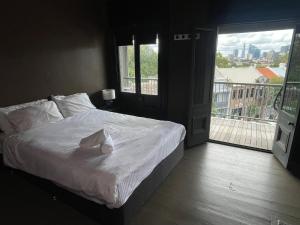 Ένα ή περισσότερα κρεβάτια σε δωμάτιο στο Glengarry Castle Hotel