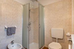 Koupelna v ubytování Baita Rustica immersa nel verde + 17 fotografií