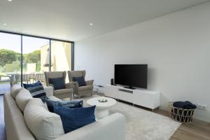 Et tv og/eller underholdning på Vilamoura Parque - Luxury Villa with pool by HD