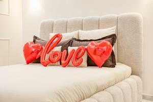 Postel nebo postele na pokoji v ubytování Creamy by Suite&Spa