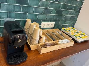 a hair dryer sitting on top of a counter next to a box at HOTEL ORENETA - Gironella in Gironella