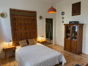 Postel nebo postele na pokoji v ubytování Apartament przy księgarni