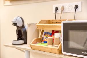 Kuchyň nebo kuchyňský kout v ubytování Creamy by Suite&Spa + 12 fotografií