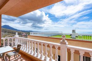 a balcony with a view of the ocean at Los Menores Sea View in Adeje