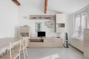 Kuchyň nebo kuchyňský kout v ubytování Donadelmar2 + 25 fotografií