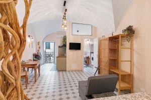 TV a/nebo společenská místnost v ubytování La Tana Dei Marinai