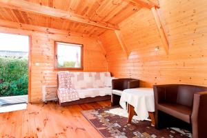 Ένα ή περισσότερα κρεβάτια σε δωμάτιο στο Ferienhaus Martynka nr 3