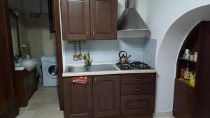 Η κουζίνα ή μικρή κουζίνα στο Trullo del Paradiso and pool +20 φωτογραφίες