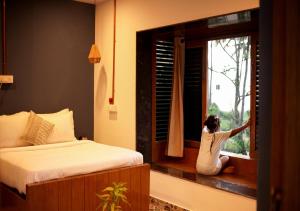 Ένα ή περισσότερα κρεβάτια σε δωμάτιο στο EKAM