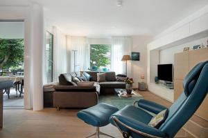 TV a/nebo společenská místnost v ubytování Annette's Luxuswohnung am Stadtpark