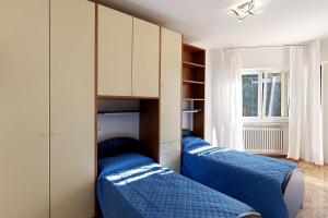 Postel nebo postele na pokoji v ubytování Casa Alizia