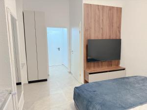 Ένα ή περισσότερα κρεβάτια σε δωμάτιο στο Wohnung IA - Modern & Elegant