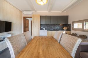 TV a/nebo společenská místnost v ubytování Villa Sa Rocca Manna