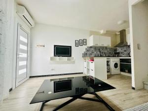 Η κουζίνα ή μικρή κουζίνα στο Global Immo 5061 Angeles 7