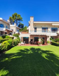 Zahrada ubytování Yades elegant villa 2 minutes away from the beach