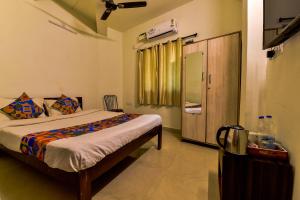 Postel nebo postele na pokoji v ubytování RBR Beach Resort-TBV