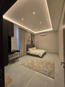 Ένα ή περισσότερα κρεβάτια σε δωμάτιο στο The horizon sanctuary villa ملاذ الافق